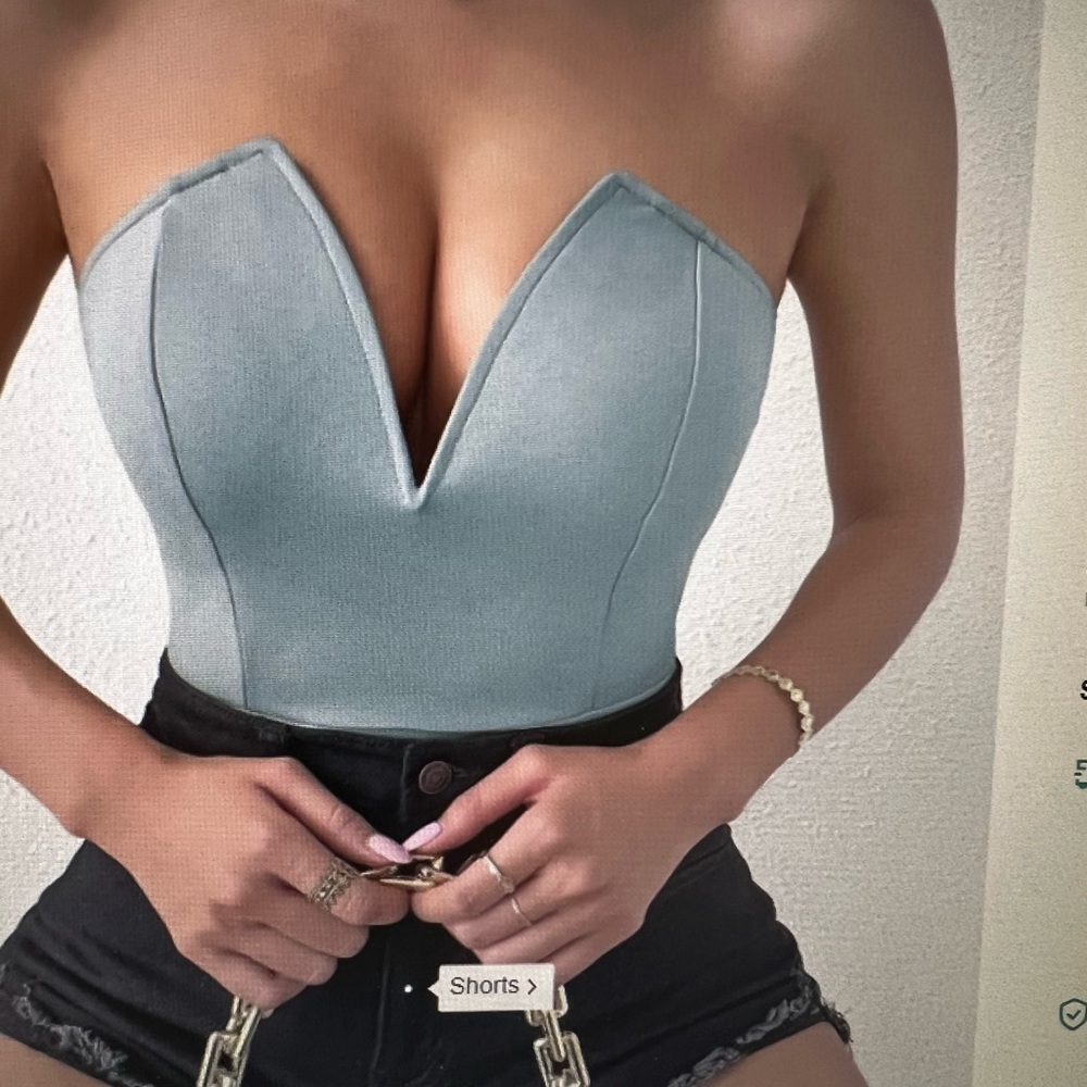 2 V neck body suits. New! Black and blue size large
